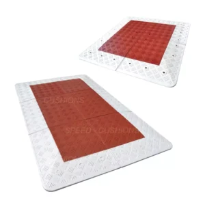 Two Belgium red and white road speed cushions manufactured by the Speed Cushion Factory