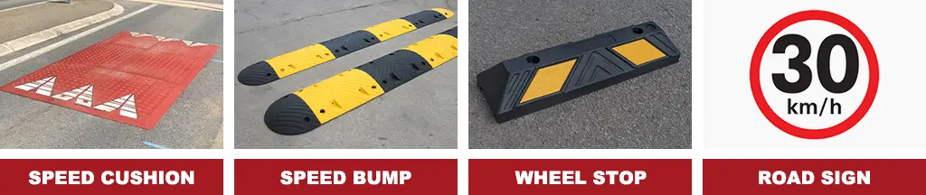 A red speed cushion, a black and yellow speed bump, a black wheel stop with yellow reflective stripes, and a speed limit road sign.